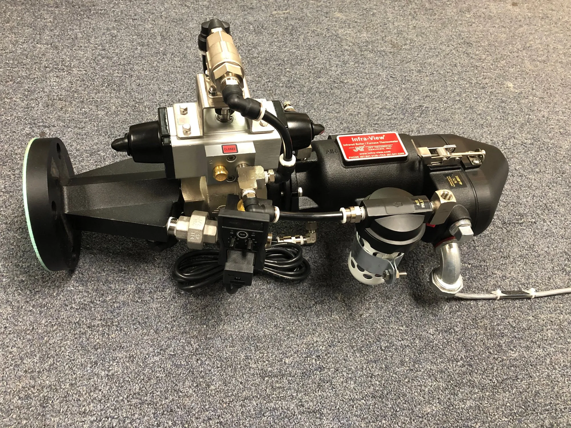 Infra-View infrared boiler thermometer, side view, showing the flange and air fittings